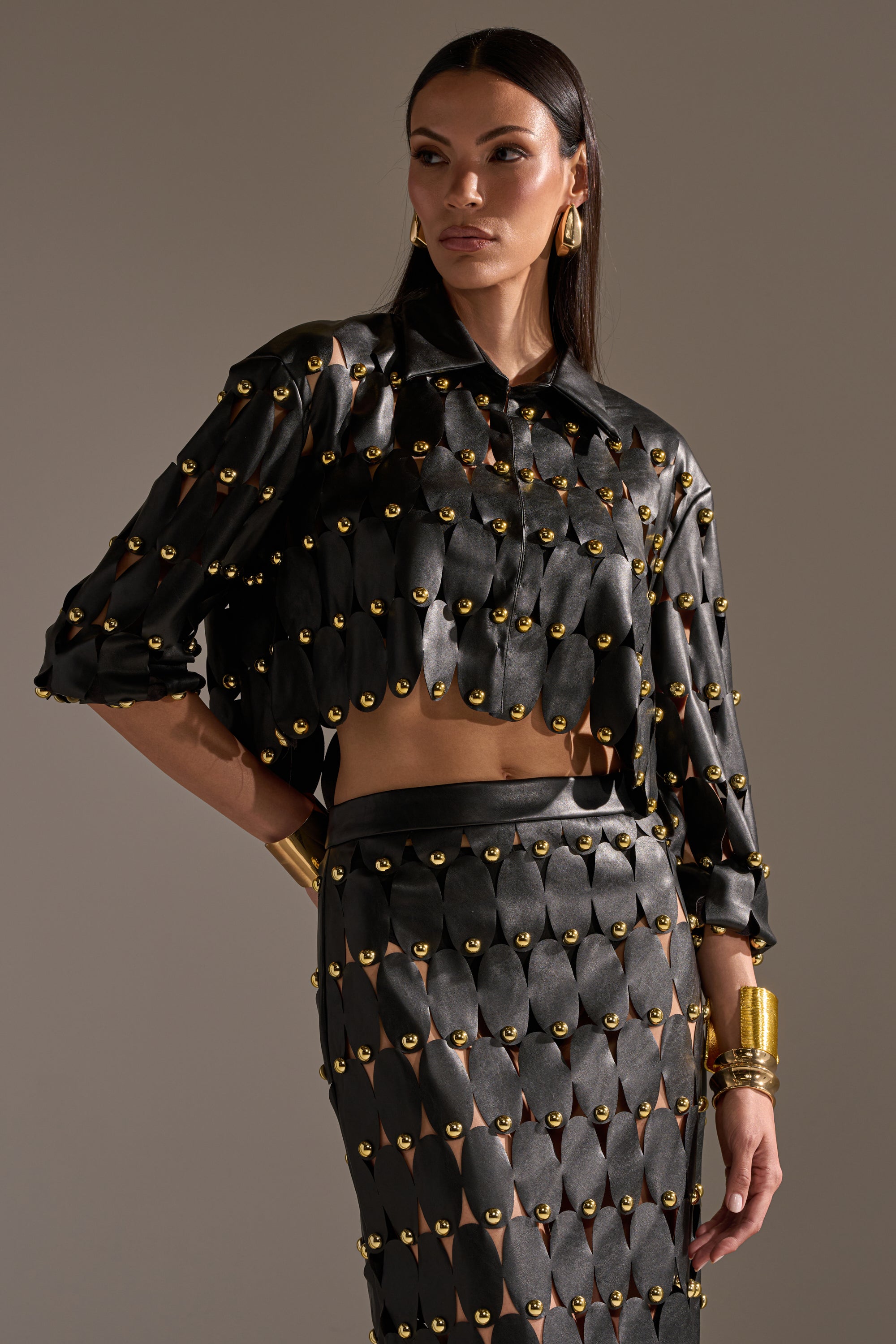 THE SNEAK PEEK STUDDED PU BLOUSE IN BLACK