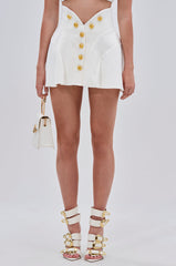 THINK ABOUT ME MINI SKIRT IN WHITE