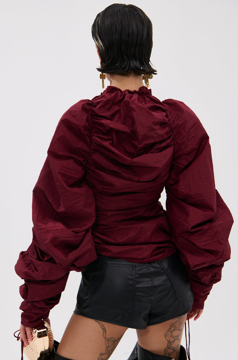 IN IT TO WIN IT RUCHED BLOUSE IN BURGUNDY