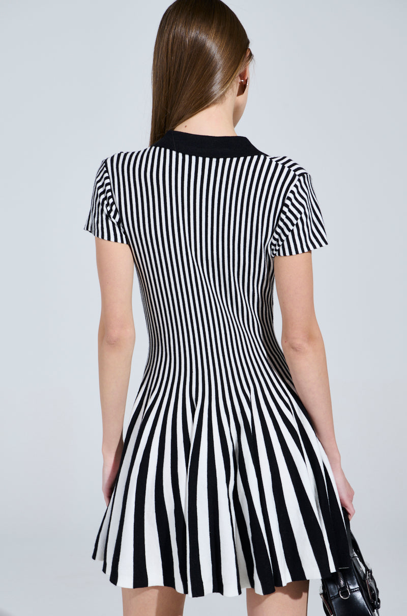 ALINA PLEATED KNIT FIT AND FLARE MINI DRESS IN BLACK AND WHITE