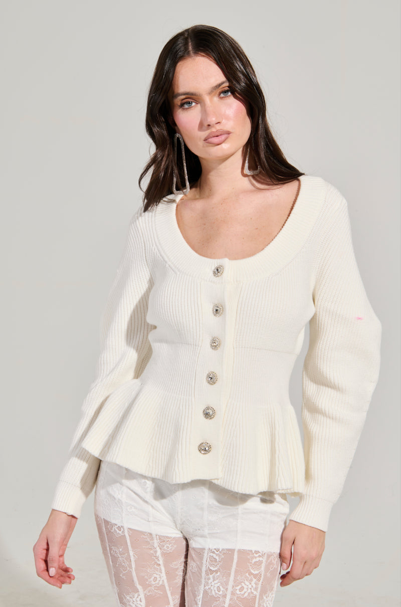 WORTH A MILLION PEPLUM SWEATER IN WHITE